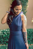 I wore it to a wedding in Spain, and I've received so many compliments! It's kinda heavy from the material but honestly I didn't really notice, the dress is very versatile and I did change the style of the dress for the wedding ceremony and the reception... that's how easy it is! I couldn't recommend this dress enough! - Merari N.