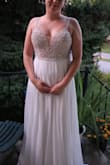 I am in love with this dress. It's flowy, light and won't require much work from a seamstress. It definitely needs to be shortened but that's an easy fix. I can't wait to walk down the aisle towards my love in this dress! - Hannah K.