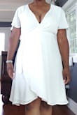 Absolutely loved this dress as my wedding dress. A little revealing in the chest area but nothing a little body tape can't fix. I recommend purchasing according to your chest size otherwise it will not cover up the girls. - Danielle C.
