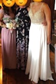 I wore this on my wedding day and people were baffled I bought it online (and for so cheap!) It was absolutely gorgeous and exactly what I wanted. I did have to alter it (hemmed it, took it in just a little, added extra cups and a bustle) but it was so worth it. I am so happy I found this dress. It was also super comfortable and fun to dance in! - Barbara B.