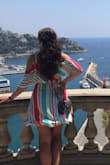 This dress is really fun. I wore it on my honeymoon in Europe and it was great for hot summer days. It wrinkles very easily and it was a little big on me in the chest. - Keslie N.