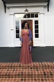 I ordered this after a long search for a "dusty rose" colored dress to wear to my sister's wedding, and I was not disappointed! The dress fit perfectly (it was too long so I needed about 3 inches hemmed, but that's typical when dress shopping at my height), was comfortable, and looks like it cost a lot more than it did. I got compliments all night long, and wore it for around 9 hours without any discomfort. The material is a little heavier than I expected, so it may not be great for an all outdoor function, but worked well for the indoor/outdoor one I attended. 

This was my first Lulus purchase, and I'll be back for more! - Shayla R.