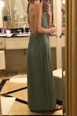 This gown is lovely and it made me feel like a princess. I actually ended up not tying the back tie because the dress is cut in such a way that it's really not necessary. I don't know how Lulus did it, but the way the dress sits you can feel comfortable wearing it without a bra. It's a showstopper, my husband loved it and I got lots of compliments. - Emma-Anne L.