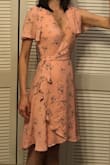 I wore this for a wedding as a bridesmaid, the dress is super flattering on numerous body types. I am tall and so I really appreciated that the high-low cut of the hem wasn't too drastic, it honestly was a lovely length on me but also on my friend who is barely 5'5". Very versatile and pretty. Also super well made, the lining is thick enough that you didn't have to worry too much about your undergarment color despite the dress's light color. - Emma-Anne L.