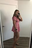 This romper is so cute and flouncy! Fits tts and is very flattering. It's a little short but I am on the taller side, but it's not to short to wear out comfortably and nothing hangs out. I don't think you can really wear a bra with this romper so you'd either use petals or wear nothing. I would definitely recommend this romper! - Jillian D.