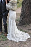 This dress is beyond beautiful, the lace is stunning! The dress was so perfect for our outdoor fall wedding at a rustic venue. I could not bring myself to spend $1000 plus for a dress that I was going to wear only one night and was skeptical ordering online but am so glad I did! It fit completely perfect right out of the bag, no alterations needed. I was struggling to find something that complemented our venue but was still a "wow" piece. This dress checked all the boxes. Our wedding day was cold ( 45 degrees Fahrenheit) and this dress allowed me to somewhat layer up with undergarments. I topped the dress with a faux fur shawl for added warmth. The amazing quality was absolutely worth the price and I couldn't be happier with my dress! - Codie A.
