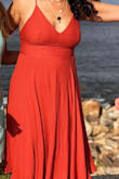 I really loved this dress and got lots of compliments! The burnt orange worked really nicely with my olive skin and the fit was really flattering on a curvy lady like myself. The straps can cut into your shoulders, since it has to be very tight to hold everything in place, but besides that it was a lovely dress. Did wrinkle easily- especially noticeable after packing it in a suitcase for travel - Silvi G.