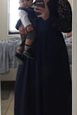 It is beautiful and the quality too, but a little snug on the waist. If they could put some stretchy fabric so it will be more comfortable breathing and it would be great overall. The length of the dress is so long so I had to get it altered for $45 just to cut 6" at the bottom. You'll be comfortable moving your arms since it is open back, I have no problem carrying my son and move around. I could say it is great fit for woman with a big cup sizes, because the dress looks flat on mine since I only used a sticky strapless for a braless look. But overall it is a good dress. It's just so long and snug at the waist. X-large would be so big on my arms I guess. - Mary A.