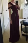 This dress fits nice and snug in the ribs, which makes it supportive in the chest. I had to shorten the straps and hem, but then it was perfect! The material is high quality and the colour is a rich purple-ish burgundy. I ordered size small. - Erin C.