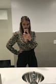 So I love the pattern on this top and the deep V. It's a fun derivative from usual basic solid colored wardrobe. I can wear it to the office but also for a night out with high waisted jeans and heels. Problem is, with the medium, my B cups do not fill it at all. And then the sleeves are billowy and fun but then around the wrist is really large/long (even though I would think with the buttons it should be more fitted) I'm usually in the M-L range for tops and I can almost do a small with this one but I'll Stick with the medium. Paired it with some high waisted paperbag style pants and it was fun outfit for a work presentation! - Allyson S.