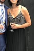 This dress is great quality. The smallest part is the bottom of the sequence and then the pleated skirt makes it so comfortable without any need for spanx. I did not need a bra either since the top was adjustable (and did not loosen all night). So many compliments and I highly recommend. - Lisa C.