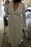I was so excited about this dress since I'm eloping in the desert in November. It fit right in the chest but everything else was so big! The sleeves were way too long and baggy. It was even baggy in the armpit area. Besides that, it's made with great quality and fabric. It was super flowy and pretty, but just too big and not for me. - Katelyn P.
