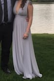 Wore this as my MOH dress to a wedding and it fit great. It seemed long when i wasn't in heels but it was the perfect length with average height heels. If you are short you will need it hemmed. I also used double stick tape to ensure the dress didn't move in the chest area while i was dancing. - Jennifer D.