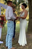 I ordered the dress last second because my first dress was way too small(from a different company). I was super nervous because my wedding was only 3 days away but the dress came in time and was way better than I expected! It fit like a glove. I naturally have a larger bottom(size 5) compared to my top(size small) but the dress looked like it was tailored to me. LOVED IT! The material is thicker(I wore lingerie under mine and you couldn't see any outlines). I wore 4 inch heels and the dress sat perfectly on the ground. - Brittany D.