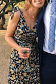 Loved this dress! Had to get it altered a bit, but received so many compliments and decided to actually wear it again for my brother's wedding. It didn't exactly fit my bust as I wanted it to, but with the print, you couldn't tell. It is flattering in all the right places and stayed in place when dancing the whole night! - Cameron G.