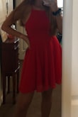 Loved the material, color, and design of the dress. Was pretty hard to get into and took my friend 25 minutes to straighten/ tighten the back. Overall was a good dress, just didn't feel right in it since I have wide shoulders and a broad back and ribs. - Molly O.