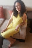 I just bought this dress and wore it for Easter, the color is great, it fits like a glove... and due to being short it fits a little longer, but that make it's more elegant. It's a GREAT DRESS! I bought the blue one also. I would very much recommend to buy it. - YURANY N.