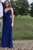 I'm in love with this dress! I would recommend getting a size smaller than you usually are, I'm usually a small and for an XS fits perfect. The length in heals was perfect on me. I also love where it comes in, right below the bust. - Angelique C.