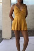 It's a beautiful romper, I love the color and quality.The length is perfect for my height. For small chested ladies like me, it gapes open a lot on the chest area, I am going to use fashion tape or wear a sticky bra, either way I love it and I will just have to make it work . - Hanzel F.