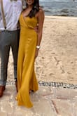 Amazing dress. The color is beautiful, the fit was perfect, and the slit makes the dress more fun. I wore this to a wedding on the beach in Thailand and got so many compliments on it. I was also sweating a lot in the humid Thailand heat and it didn't show through the fabric at all which is definitely a plus! - Stephanie S.