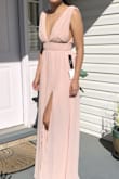 I tried this on as a potential bridesmaid dress for my friend. This color in particular wasn't chosen so it was returned but its definitely a beautiful color! Also, the dress design is amazing. I was worried how I'd look in it it because I have a relatively small bust but I think the dress is still really flattering. I'm also pretty short and this is a really long dress so the length would have to be altered but I'm pretty used to that! Also, I tried this and the light blue version in the exact same size yet somehow the light blue was a perfect fit and this felt a little tighter, which I found a little odd. Regardless, beautiful dress!! - Lizeth T.