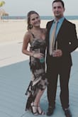 I first ordered this dress in an X-small because I'm pretty short, but couldn't even get it around my ribs. I reordered a  small which fit well at my chest (I've got a relatively large chest) but was loose around my stomach. A $20 alteration fixed that however. I got so many compliments while wearing it at a beach wedding in July. If you're around my height I'd suggest a 1 1/2 - 2 inch heel for it not to drag. Very flattering, i would recommend it! - Rachel W.
