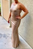 After reading just about all of the reviews, I decided to purchase the champagne colored dress (which, lets be honest, it's truly a rose gold color to die for!!) for a military ball. I was hesitant because I needed a bigger size than what most of the reviews were.  The dress arrived and fit perfectly. I wore spanx underneath and was even able to wear a strapless bra (I just lowered the back strap a little so it wasn't visible). The zipper on the left side sticks a little, due to the sequins and fabric, but it works. The material is stretchy and moves with you.  Some sequins do fall off, but it is not noticeable on the dress though.  I also purchased the shoes to match (LOVELINESS ROSE GOLD ANKLE STRAP HEELS Lulus Style 539607). Wearing the shoes with the dress, at my height, the dress didn't need any alterations!! I'm so in love with this dress and received SO many compliments! I'll definitely be back to get this dress in the navy color! - Jocelyn C.