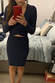 Very form fitting, def made for fall/winter weather...it's like a sweater material so it's a bit thicker than expected but I love it! - Kim W.