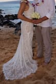 I bought this dress as a beach wedding dress. It fit perfectly. I loved the little train on it. The price was more than fair and perfect for a beach wedding as I was not afraid to âmess this dress. The dress is made nicely. I truly loved my wedding dress. I felt pretty. - Ruby S.