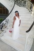 This dress was perfect for my beach vow renewal. I first ordered a medium, but it was tight across my chest. Returned and within 3 or 4 business days received a large. Order this dress... you will not regret it!! - Sophronia T.
