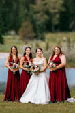 My girls were different sizes, and it worked for everyone perfectly. (I also ordered a blue one for myself for my rehearsal dinner). 

FIT: Two of my girls are in S, and one is in an XL. I (bride) fit into both S and M no problem. This fabric is SO stretchy and comfy. My one bridesmaid was in 3 weddings this summer, and she said this dress was by FAR her favourite. They aren't sweaty, and they're perfect for dancing. It even works just fine for ladies with larger chests. 

TIPS: the bottom edge is raw (unhemmed). My dress was a little long for me, so I just took the scissors to it and shortened it myself and it turned out fine. If you're skinny and tall, you likely won't want to wear heels. I think the length changes with the size. If you want them cocktail length, getting them cut wouldn't be difficult. 

They wrinkle. You MUST bring a steamer or iron to your wedding, and make sure they stay hung up. Once steamed, and the girls had them on, they were perfect. 

COLOR: the color in the ad is pretty accurate. I found in bright sunlight they photographed quite red, but indoors and in low light they looked more burgundy. 

10/10 I would recommend this dress for bridesmaids on a budget! Because they're on the simpler side, fabric wise, I think you could easily shorten them and re-wear them. - Haileigh J.