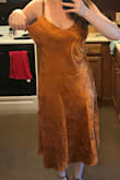 The fabric is gorgeous, and the mid calf length is perfect for me. But unfortunately, the fit is awkward and needs fixed. There is a lot of extra space around the upper chest area, and some extra fabric at the lower back that causes bunching. It does fit me decently well in the hips. I would return and get a smaller size, but it will probably fit better if I just have it tailored instead anyway, so I suppose I'll keep it. - Rebecca L.