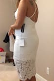 This is the most elegant, feminine, sexy dress I've ever tried on. Most reviews say you need petals or a backless bra, however, if you're petite with a short torso like me you can get away with wearing a strapless bra! Love the adjustable straps! Can't wait to renew my wedding vows in Vegas wearing this dress!! Lulus please always carry this dress... I'll be ordering the navy blue dress when back in stock! - Amy F.