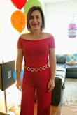 I am very pleased with my purchase. It's exactly what I was looking for, a sexy and feminine jumpsuit to compliment my 5'2" height body. It's extremely long, but that's an easy fix. I wore it for my 50 birthday. I was very happy with how fast it's been delivered to Toronto and customer service was excellent, keeping me informed at all times. - Adriana N.