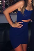 This dress fits amazing and looks even better! The cut-out in the stomach is a really great touch and is super flattering! I got so many compliments! It's also thick enough to wear without a bra which is a plus! Only good things to be said about this dress!!! - Kelly C.