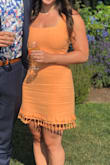 I wore this dress to a summer wedding and got a bunch of compliments on it! I originally ordered it in a medium but had to reorder in a small. The material is thick and comfortable. There is a zipper in the back. I was able to wear a bra under it and the straps didn't show I would recommended this! - Noam M.