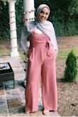 I'm usually a large but ordered an XL to be safe and it was a good call! The material is soft and airy. It does crease a little so you do have to iron but I felt very comfortable and wore a white long sleeve underneath to stay covered. Overall, I loved it and got many compliments! - Nazea K.