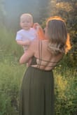 Loved this dress. Fit perfectly, based size on other reviews. Perfect look for family photos. The back of the dress is super cute. Unable to wear a normal bra but a sticky bra works well with this. - Lyndsey U.