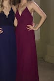 I was hesitant to try this dress at first as a more busty gal but it ended up being really flattering and cute with out an excessive amount of cleavage, I loved the slightly higher look in the front and longer in the back with the ruffles it was very flowy and a gorgeous maroon/burgundy color! - Holly F.