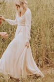 I was looking for something flowy and classic feeling and this dress was perfect. Because of the wrap style the slight extra fabric was not a problem. - Abbey C.