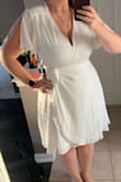 This was my first time buying from Lulus, so I was very cautious. I was looking for a white dress for engagement photos, bridal shower, etc. I looked at tons of dresses, and eventually ordered this one because it had great reviews. I am honestly so happy I bought it! It fits perfectly, I love the flowy material, and it's a great length. It's hard finding nice dresses online, as I'm not the average body shape. But will definitely be ordering more! - Sarah D.