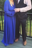 I love this dress so much. Wore it to a wedding and got so many compliments. I ordered an XL just to be safe - and it's too long and the slit is high! But I'll be getting it brought up through alterations and it'll be perfect for a rehearsal dinner I have coming up. Worth every penny!! - Taylor B.