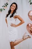 I bought this dress for my bridal shower and I loved it so much! I receive sooo many compliments on it. I did have to iron some to make the flowers lay flatter on my back but it was an easy fix. The dress was very comfortable. It does tend to gap a little on the sides due to the open back but a little double sided tape fixes that. So happy with this purchase! - Amanda W.