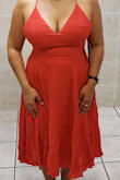I wore this dress to a wedding and got so many compliments. I did wear petals but you can wear a strategically placed bra or none, and/or spanx. The dress looks beautiful after being pressed by the cleaners. I did try a medium at first but I'm big chested, curvy and have broad shoulders and it just didn't look right. Do not be influenced by weight, everyone carries it differently. Your chest size is the deciding factor when selecting your size for this dress. The material is thin and very lightweight, there is a matching colored slip. It can be dressed up or down. I loved this dress and will be wearing it again. - Nancy S.