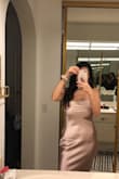 I just adore this slip dress. It's a shiny satin rose color that was so perfect for one of my bachelorette outfits! I wore the dress with a pair of clear mule block-heels and a white clutch. I will say it's made for fuller hips since I didn't fill in the dress as much in that area. But either way it looks and fits great! - Denise T.