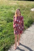 I loved this dress! It was very comfortable and was great quality. The only thing I will say is if you have a larger bust, consider wearing with a belt. It looked baggy without. With that being said, this was a great purchase! - Raina S.