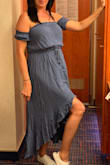 Love this dress. It is true to size and very flattering. You can dress it up or down... very very comfortable.... I wore with tennis shoes on multiple plane rides coming home from vacation. - Anna K.