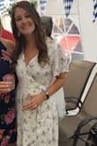 Wore this dress to my bridal shower. Loved the style but needed to pin a little higher to make it less revealing. - Shannon F.