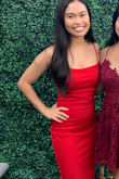 It is beautiful! I wore it to a wedding. It's tight, but the material is stretchy. I had to pull it down throughout the night to smooth out the creases, but it didn't bother me. The color and material make it worth it. - Christine P.