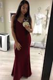 This dress is perfection! I was a bridesmaid for my sisters wedding and ordered this dress last minute. I did need to get it tailored, simply because I'm on the shorter side. Besides that, this is the most beautiful and quality dress I've ever owned. I will be ordering all my important dresses from this site from now on. I can't stress enough how much this dress saved me for that day. I received tons of compliments. - Alexandra L.